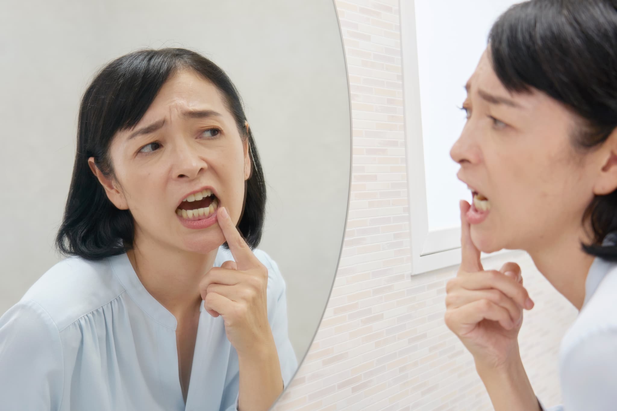 インプラント治療後に違和感が気になる女性