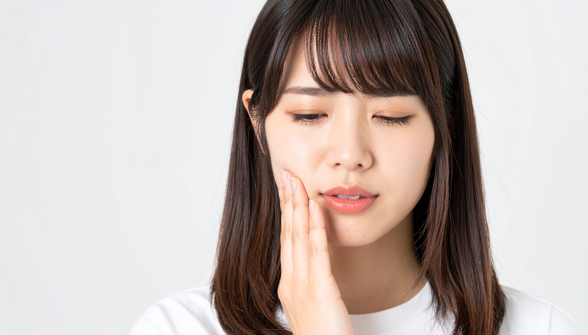噛み合わせが悪くインプラントに影響が出ている女性